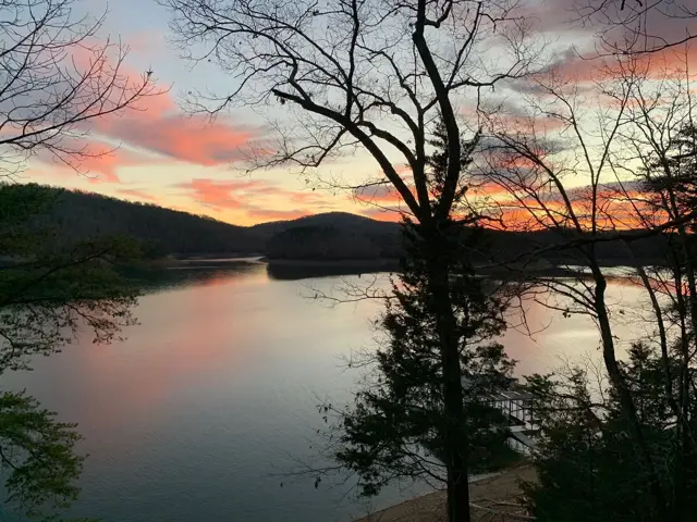 Orange sunset over Norris Lake from Parsons Shores Lodge